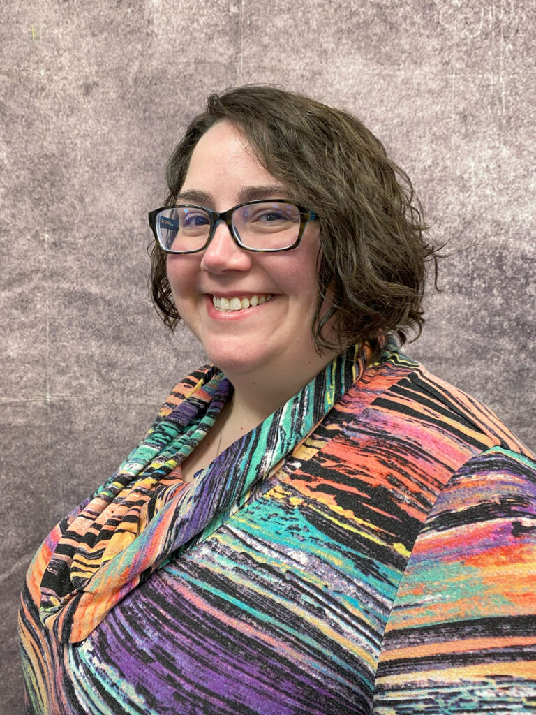 A picture of a woman smiling.