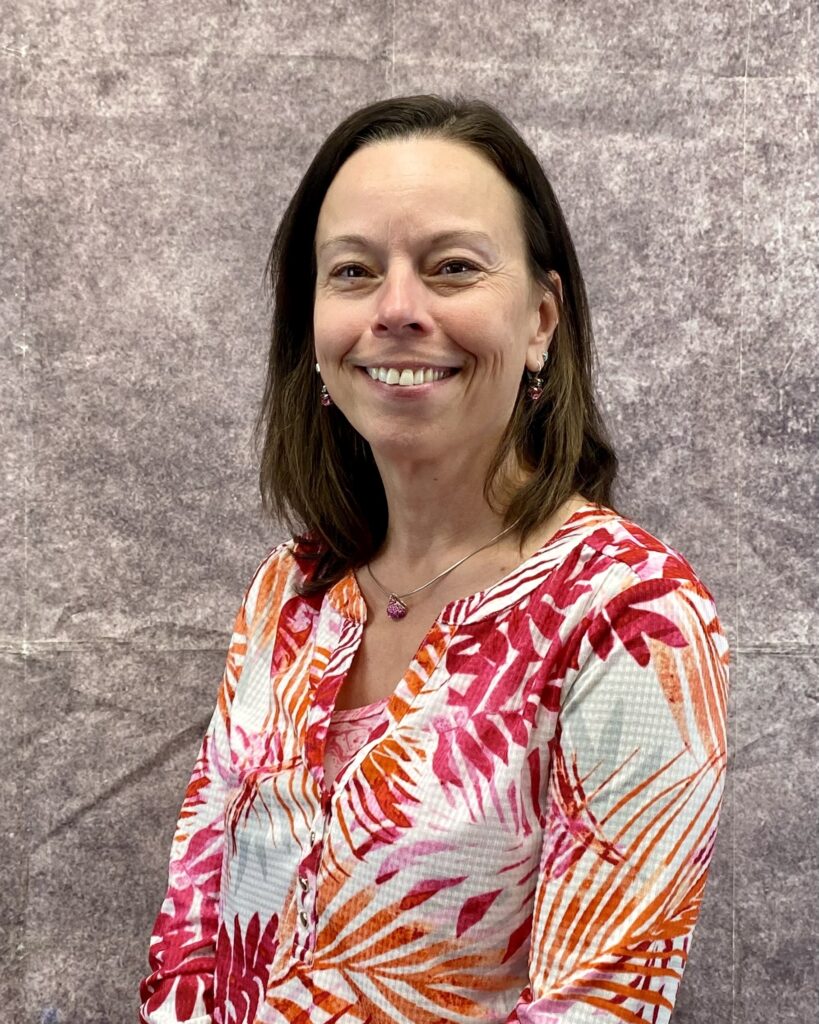 A picture of a woman smiling.