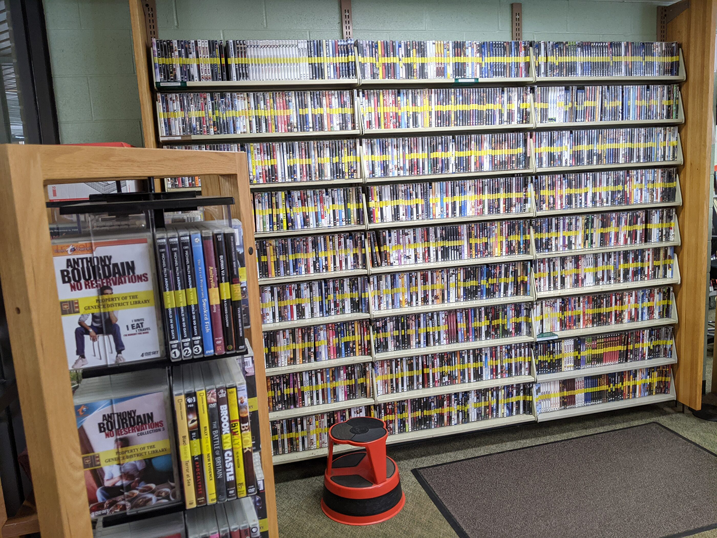 A shelf of DVDs at the Baker Park Library